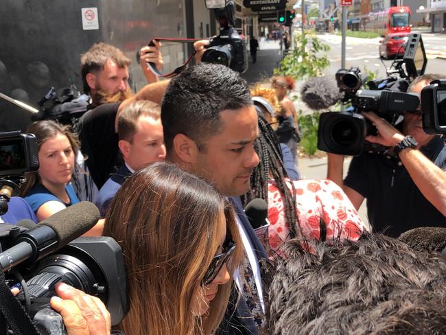 Jarryd Hayne swarmed by media as he left Newcastle District Court on Monday. Picture: Heath Parkes-Hupton