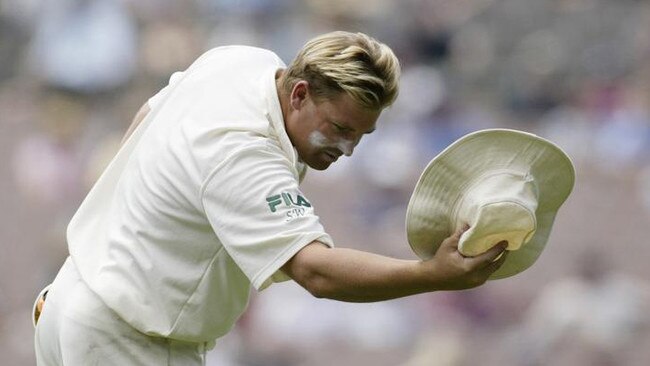 Shane Warne with his iconic white Greg Chappell hat. Picture: Hamish Blair/Getty Images