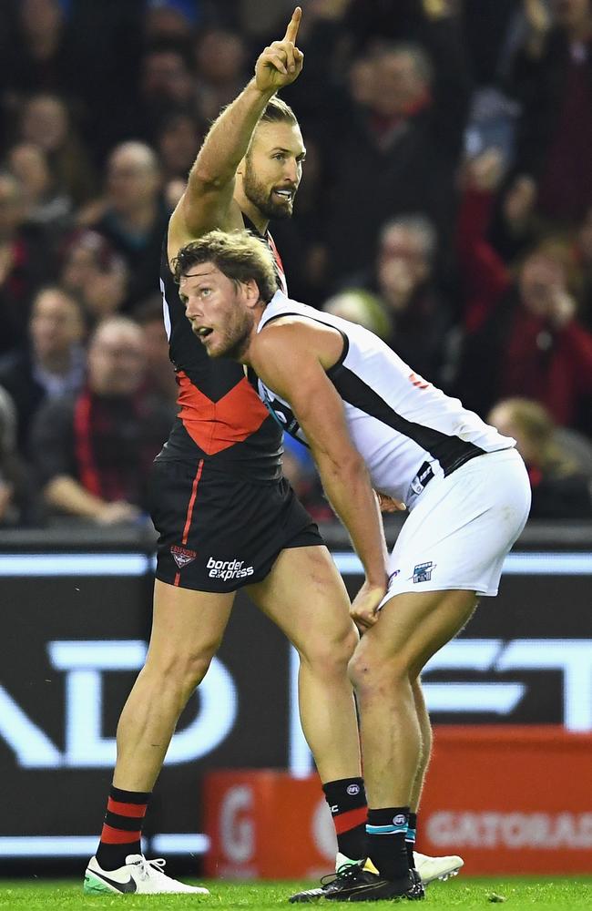 Cale Hooker of the Bombers celebrates kicking a goal during Essendon’s big win against Port Adelaide.