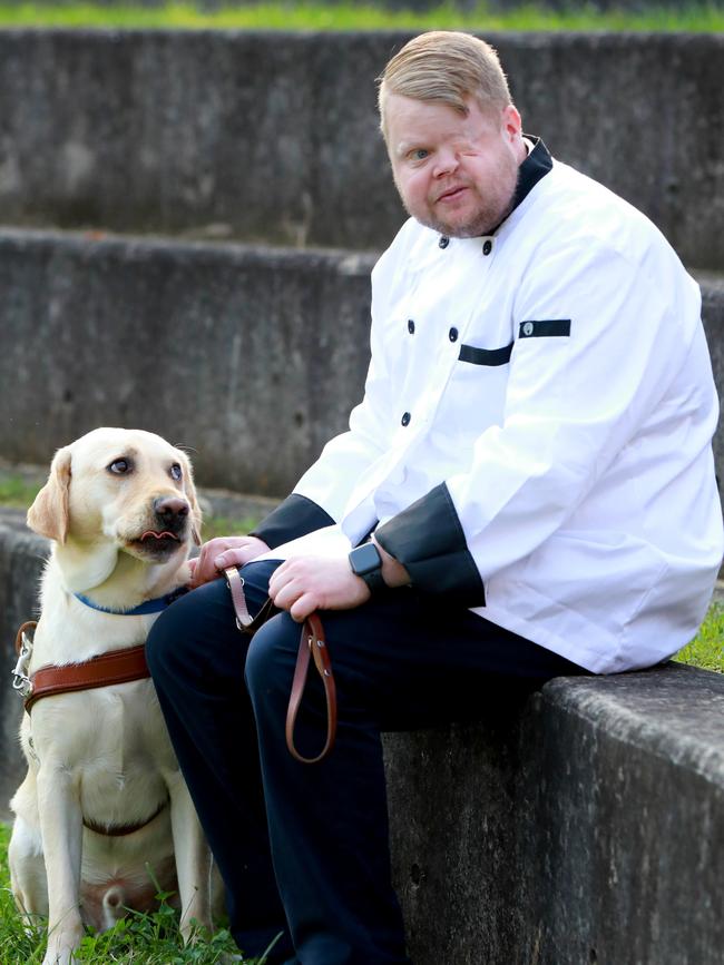 Shanahan with his guide dog Rocko at Kingswood TAFE. Picture: Angelo Velardo