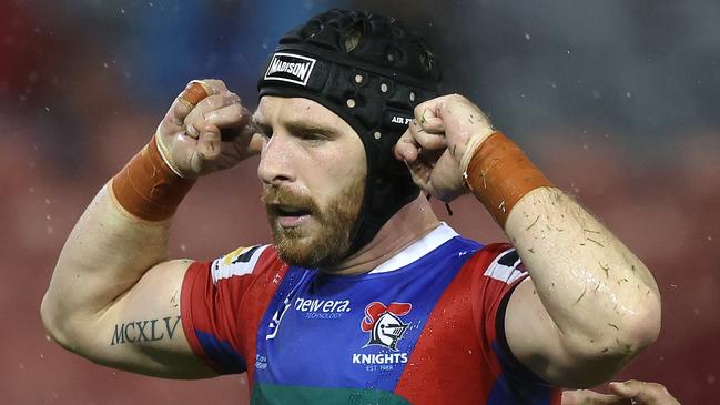 NEWCASTLE, AUSTRALIA - APRIL 05:  Jackson Hastings of the Knights celebrates with team mates after scoring a try during the round five NRL match between Newcastle Knights and St George Illawarra Dragons at McDonald Jones Stadium on April 05, 2024, in Newcastle, Australia. (Photo by Scott Gardiner/Getty Images)