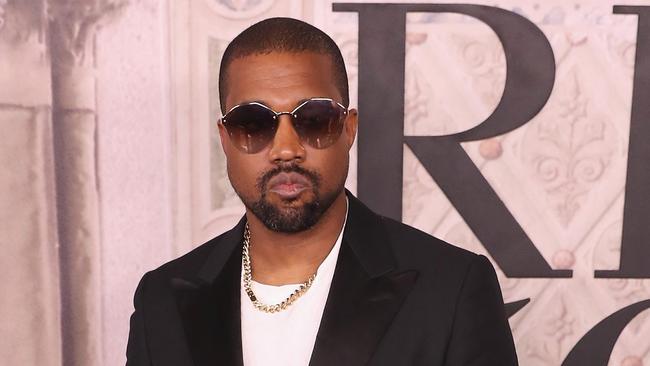 Kanye on the red carpet before the Ralph Lauren show. Credit: Rob Kim/Getty Images/AFP