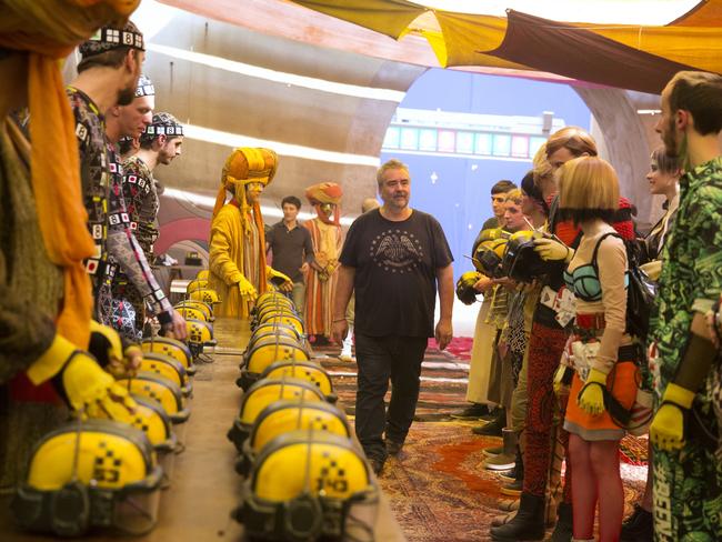 Besson takes a walk through the colourful Paris set of Valerian and the City of a Thousand Planets. Picture: EntertainmentOne