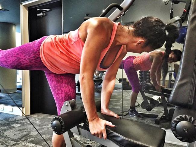 Shari working out in the gym.