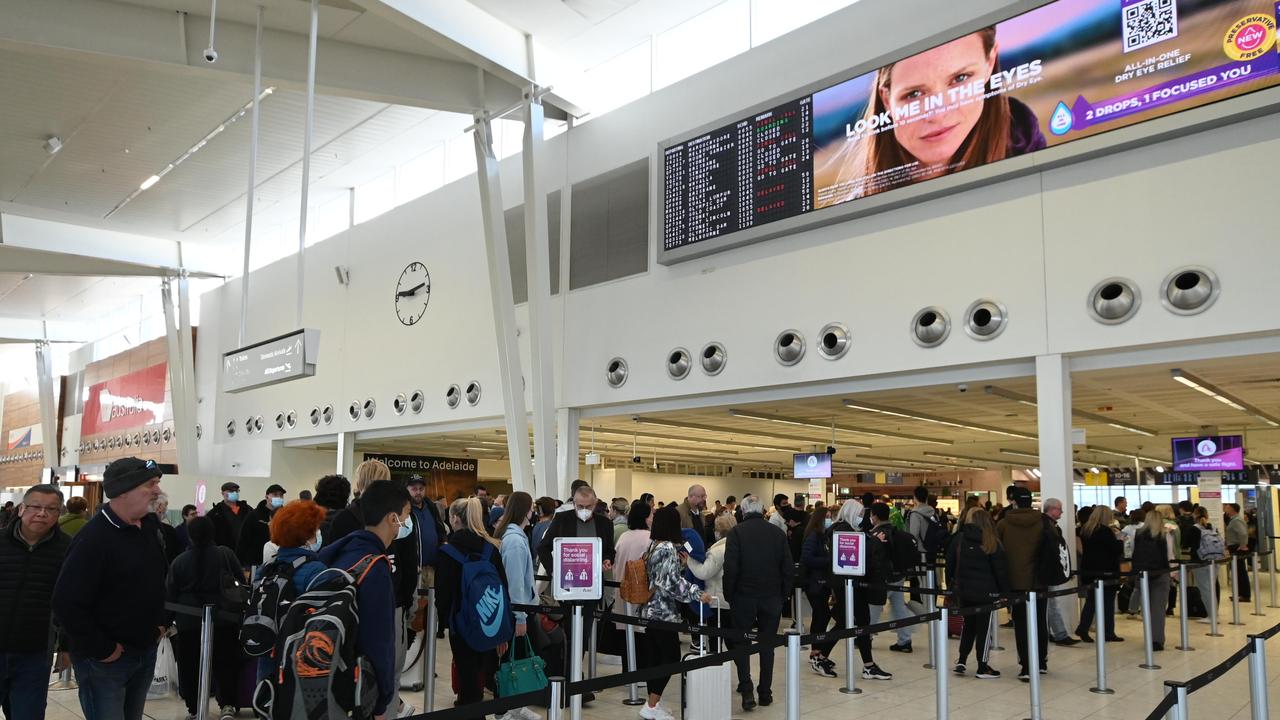 Passengers at Adelaide Airport are being warned to brace for delays and cancellations as school holidays arrive. Picture: NCA NewsWire / Naomi Jellicoe