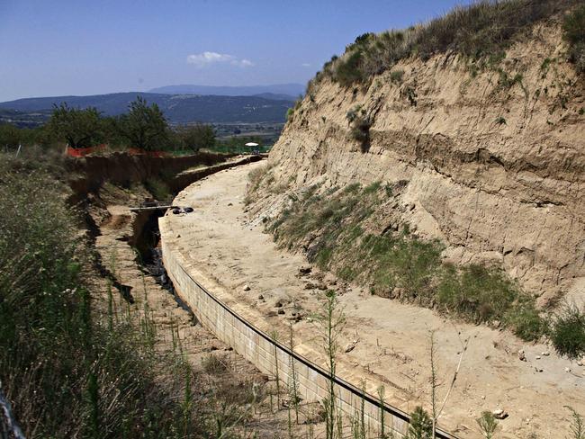 Outer wall ... A partial view of the site where archaeologists are excavating an ancient mound in Amphipolis, northern Greece. Source: AP