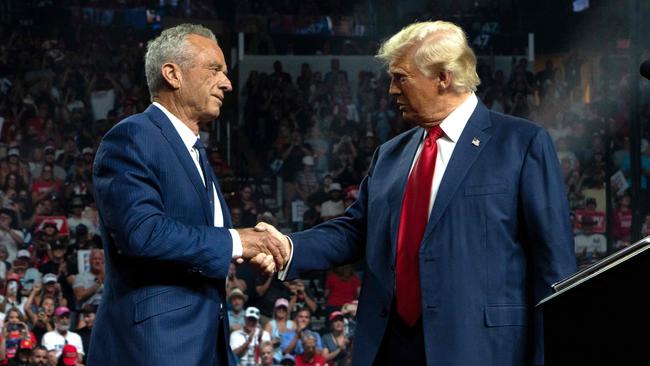 Former Republican presidential candidate Robert F. Kennedy Jr. and Republican presidential nominee, former U.S. President Donald Trump shake hands during a campaign rally in Glendale, Arizona. Picture: Getty