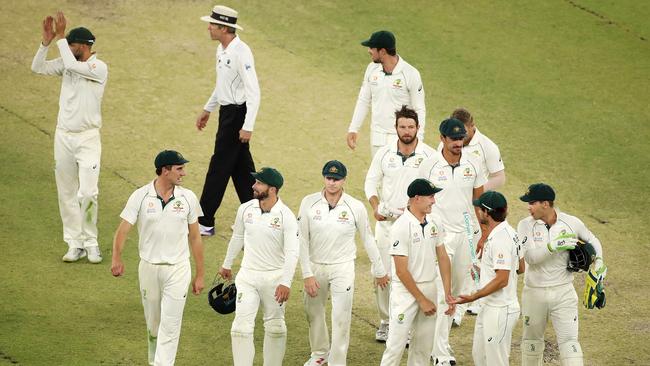 The Australian team head off the field after their big win. Picture: Getty Images