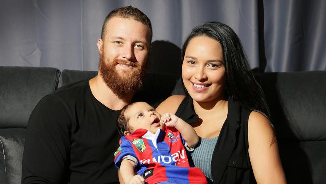 Knights player Korbin Sims and Partner Tarin Moke with Baby Taavi at their Newcastle Home