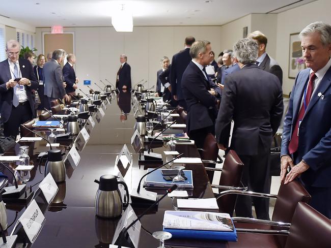 US Federal Reserve Board Chairman Jerome Powell (R) looks on before a meeting with the Finance Ministers and Central Bank Governors of the G7 nations during the IMF and World Bank Fall Meetings in this 2019 file photo. Picture: AFP