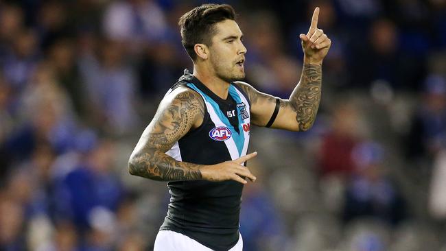 Chad Wingard signals to the bench after injuring his hamstring. Picture: Michael Klein