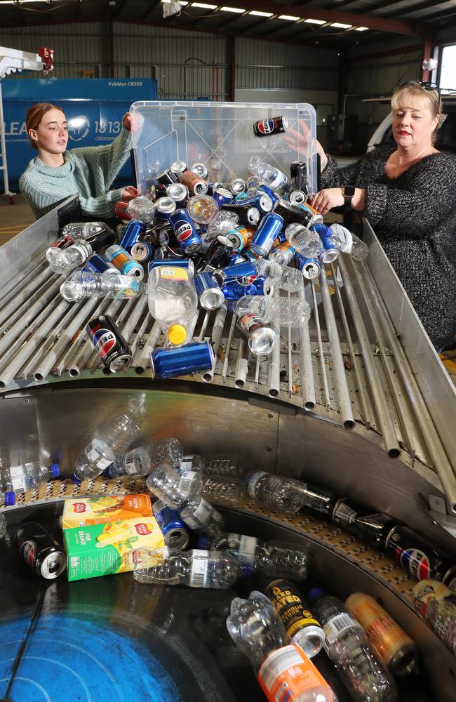 Barwon residents Scarlett and Hayley Blair deliver an haul of cans and bottles as the state reaches a milestone 500m containers recycled. Picture: Alan Barber