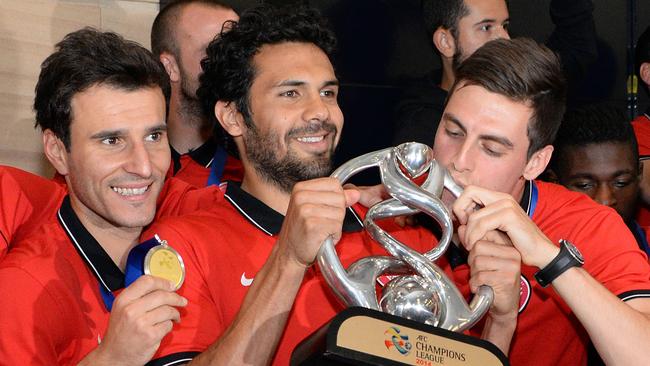 Captain Nikolai Topor-Stanley (C) celebrates with teammates upon arrival at Sydney. (AFP PHOTO)