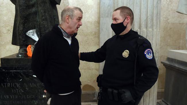 A supporter of President Trump is arrested inside the US Capitol. Picture: AFP.