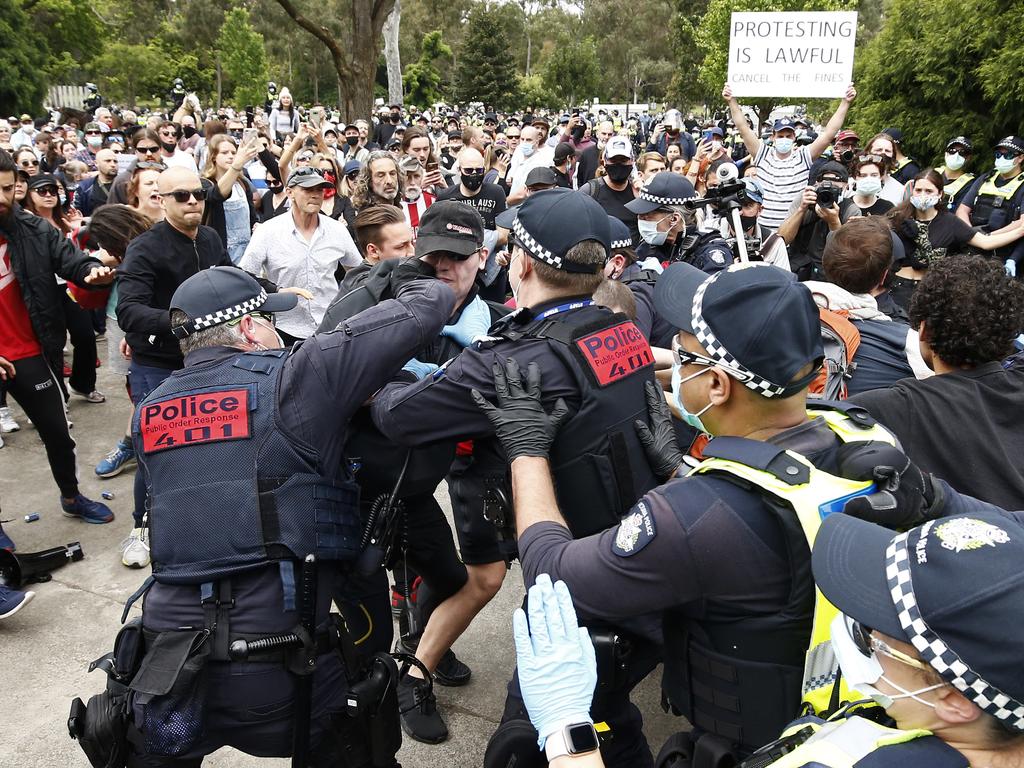 Protesters clash with police at an anti-lockdown protest at the Shrine of Remembrance in Melbourne. Picture: NCA NewsWire/Daniel Pockett