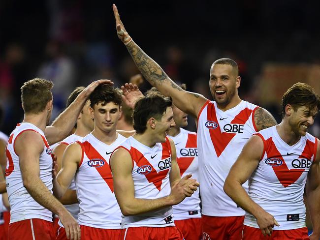 Lance Franklin and the Swans’ kids were all smiles after their upset of Western Bulldogs. Picture: Getty Images