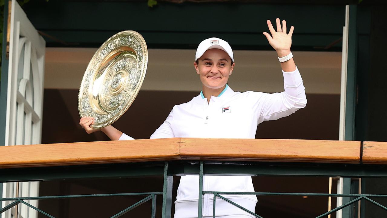 Ash Barty of Australia celebrates with the Venus Rosewater trophy