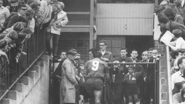 The late John Sattler heads for the dressing room after being sent off during Souths’ clash with Manly at Redfern Oval in 1967. Picture: Phil Merchant