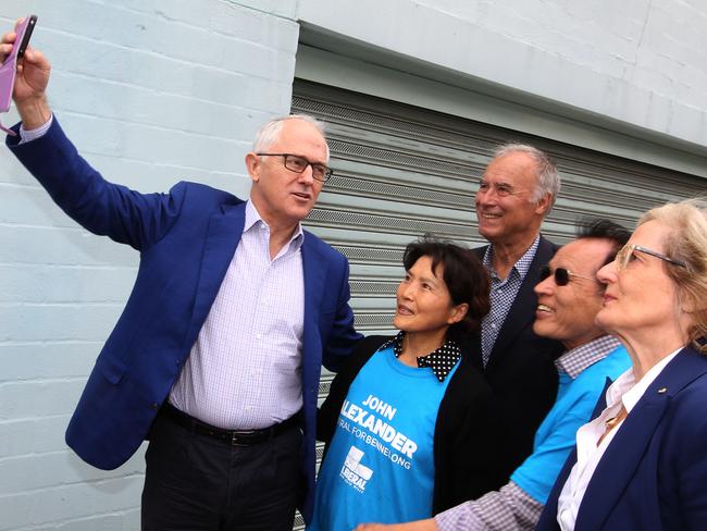 Prime Minister Malcolm Turnbull (left) with Liberal candidate for Bennelong John Alexander during a visit to the Hanho Korean Daily Newspaper in Eastwood. Picture: AAP