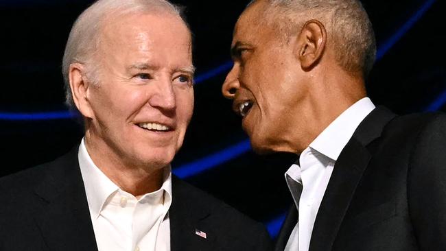 US President Joe Biden and former US President Barack Obama attend a campaign fundraiser at the Peacock Theater in Los Angeles on June 15, 2024. (Photo by Mandel NGAN / AFP)