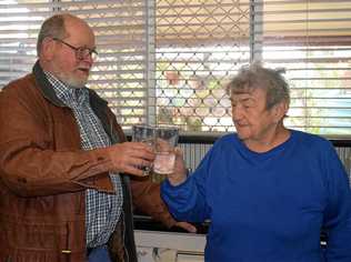 BOTTOMS UP: Joe Abbott and Phyliss Brown enjoying the first taste of Tara's potable water straight from the kitchen tap. Picture: Kate McCormack