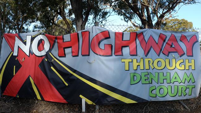 Campbelltown Council told residents around Campbelltown Rd to take "no highway" signage off their properties as it contravened advertising guidelines. They are protesting against a proposed three-lane highway. Picture: Ian Svegovic