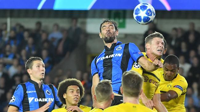 Dortmund's players vie with Club Brugge stars ones during their Champions League clash. Picture: AFP