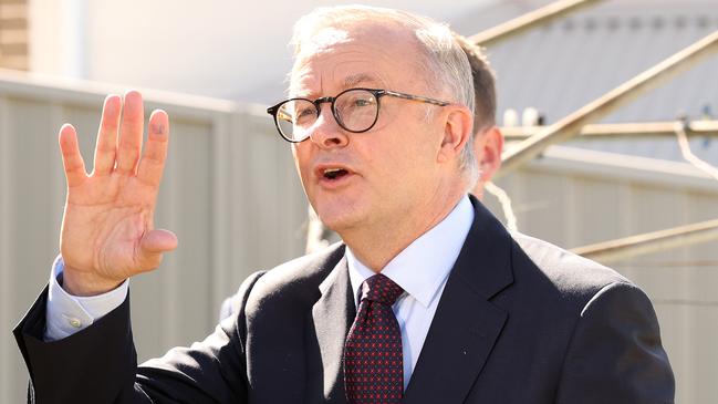 FEDERAL ELECTION TEAM 2022. LABOR BUS TOUR 3/5/2022. Labor leader Anthony Albanese during a press conference under a Hills Hoist, East Gosford in the seat of Robertson NSW. Accompanied by LaborÃs Gordon Reid, Jason Clare, Emma McBride. Picture: Liam Kidston