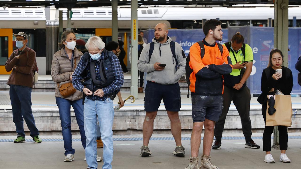 It’s still mandatory to wear a mask on train station platforms, but not everyone follows the rule. Picture: Richard Dobson