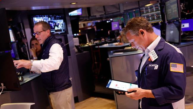 Traders on the floor of the New York Stock Exchange. Picture: Michael M. Santiago/AFP