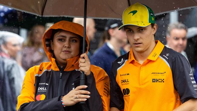 Oscar Piastri of Australia and McLaren walks in the paddock under an umbrella during the F1 Grand Prix of Australia at Albert Park Grand Prix Circuit on March 16, 2025 in Melbourne, Australia. Picture: Jayce Illman/Getty Images