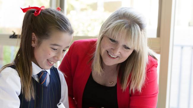 Principal Kristy Kendall with a student at Toorak College.