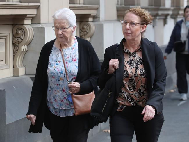 Mr Hill’s widow, Robyn Hill, arrives at the court with her daughter Debbie Hill. Picture: David Crosling