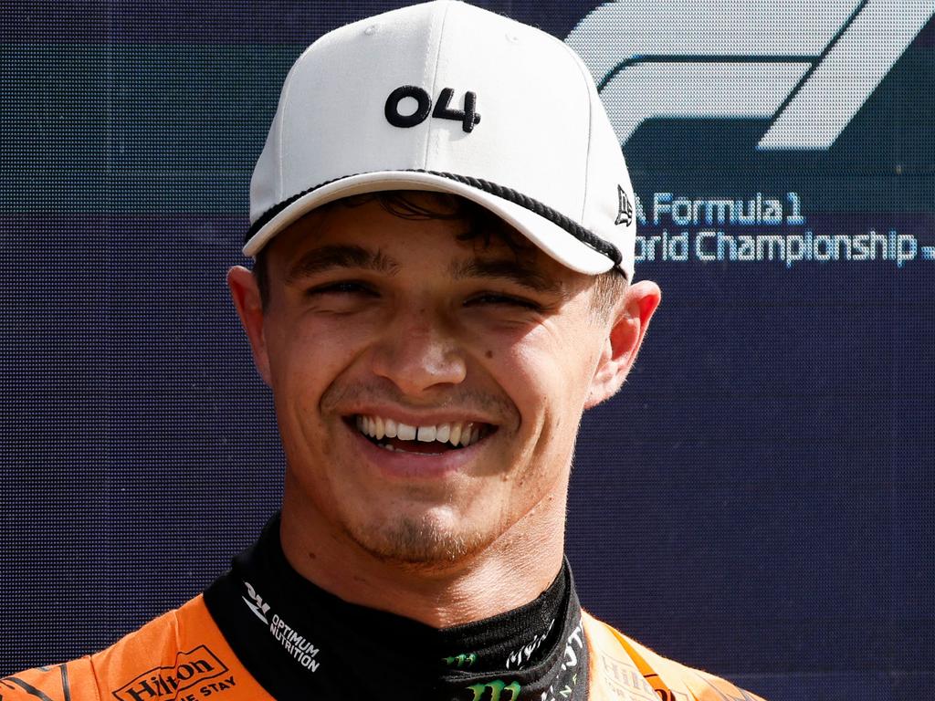 First McLaren's British driver Lando Norris poses at the end of the qualifying session at The Circuit Zandvoort, western Netherlands, on August 24, 2024, ahead of the Formula One Dutch Grand Prix. The Formula One Zandvoort Grand Prix race will take place on August 25, 2024. (Photo by SIMON WOHLFAHRT / AFP)