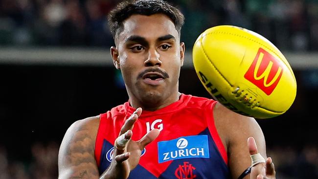 MELBOURNE, AUSTRALIA - AUGUST 23: Kysaiah Pickett of the Demons gathers the ball during the 2024 AFL Round 24 match between the Melbourne Demons and the Collingwood Magpies at The Melbourne Cricket Ground on August 23, 2024 in Melbourne, Australia. (Photo by Dylan Burns/AFL Photos via Getty Images)