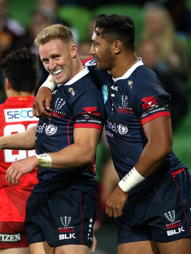 Leota celebrates with Hodge. Picture: AAP