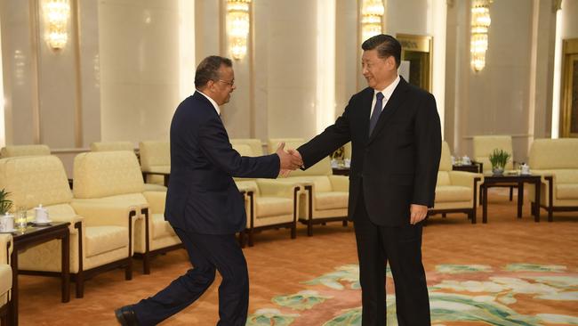 Chinese President Xi Jinping (right) is determined to come out of the coronavirus pandemic stronger than before. Picture: Naohiko Hatta/AFP