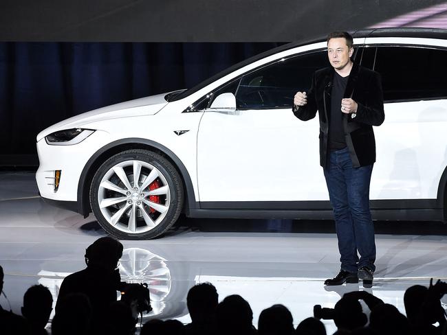 (FILES) In this file photo taken on September 29, 2015, Tesla Motors Chairman and CEO, Elon Musk, speaks at the Model X launch event in Fremont, California. - Tesla lost a staggering two-thirds of its market value in 2022, a victim of fears about demand for electric vehicles, dismay at Musk's tribulations as head of Twitter and the end of easy money on Wall Street (Photo by SUSANA BATES / AFP)