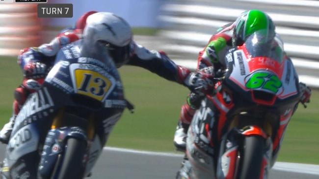 Moto2: Romano Fenati grabs the brake lever of rival Stefano Manzi mid-race.