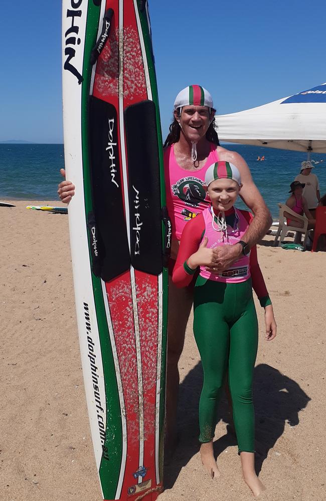 Mackay Surf Life Saving Club director of surf sports Josh Grant and daughter Isabella. Photo: Contributed