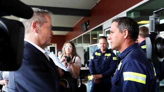 Bill Shorten and the Gladstone Ports worker during the now infamous incident. Picture: Kym Smith