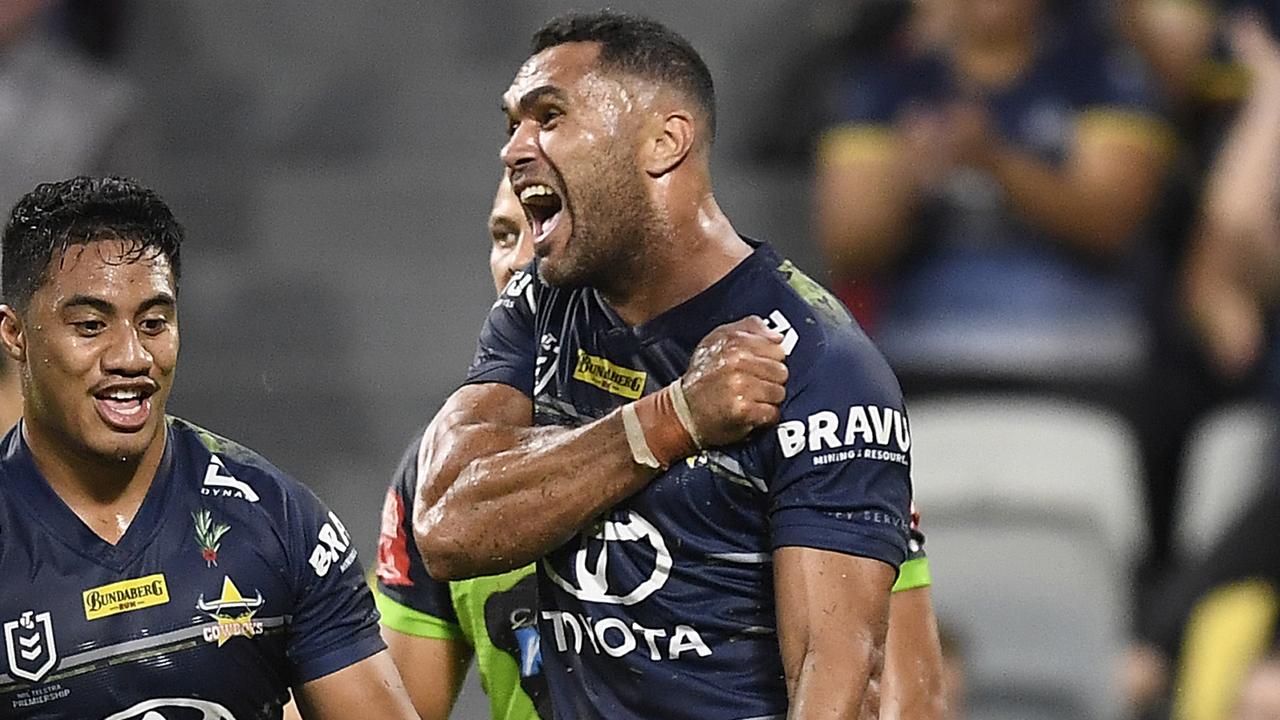 Justin O'Neil of the Cowboys celebrates after scoring a try.