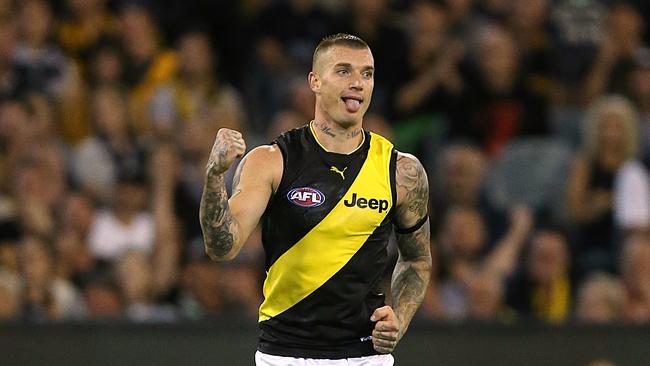 Dustin Martin celebrates a goal in front of 73,137 fans in last year’s season-opener. Picture: Wayne Ludbey