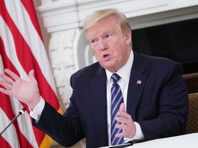 US President Donald Trump meets with Republican members of the US Congress in the State Dining Room of the White House in Washington, DC, on May 8, 2020. (Photo by MANDEL NGAN / AFP)