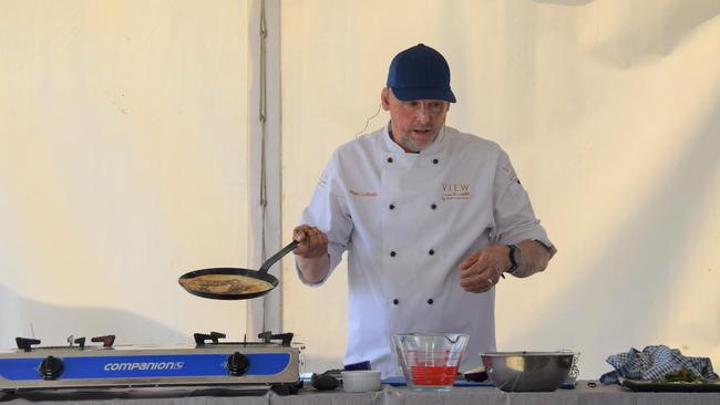 Celebrity chef Mat Golinski shows the crowd how to cook the perfect chickpea dishes at Dalby's Delicious and Delightful Festival 2022. Picture: Emily Devon