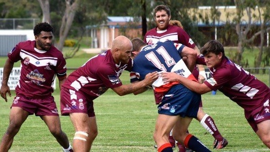 Dalby Diehards C Grade players Luke Cubby and Brendon Gesler look to wrap up the opposition.