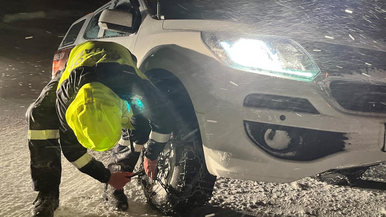 Hobart City Council workers brave think snow and blizzard conditions on their way to rescue walkers stranded on kunanyi/Mt Wellington. Picture: City of Hobart