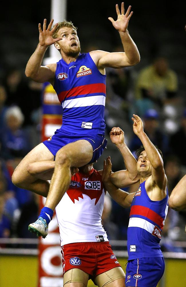 Jake Stringer flies high for a mark against Sydney. Picture: Wayne Ludbey