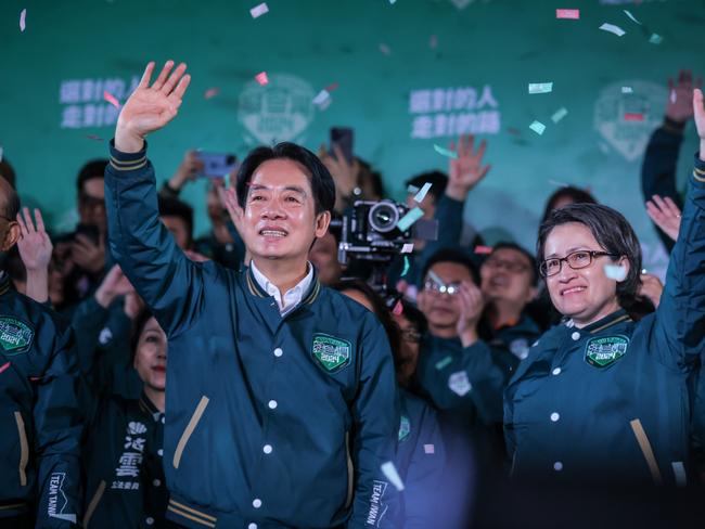 TAIPEI, TAIWAN - JANUARY 13: Confetti flies over the stage and crowd as Taiwan's Vice President and presidential-elect from the Democratic Progressive Party (DPP) Lai Ching-te (Centre L) and his running mate Hsiao Bi-khim (Centre R) speak to supporters at a rally at the party's headquarters on January 13, 2024 in Taipei, Taiwan. Taiwan voted in a general election on Jan. 13 that will have direct implications for cross-strait relations. (Photo by Annabelle Chih/Getty Images)