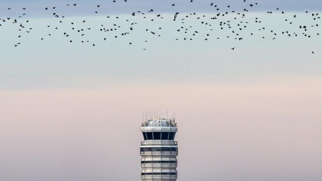 Just the day before a crash near Ronald Reagan Washington National Airport killed 67, an aircraft had to divert from it’s initial landing path to avoid a helicopter. Picture: Getty Images / AFP